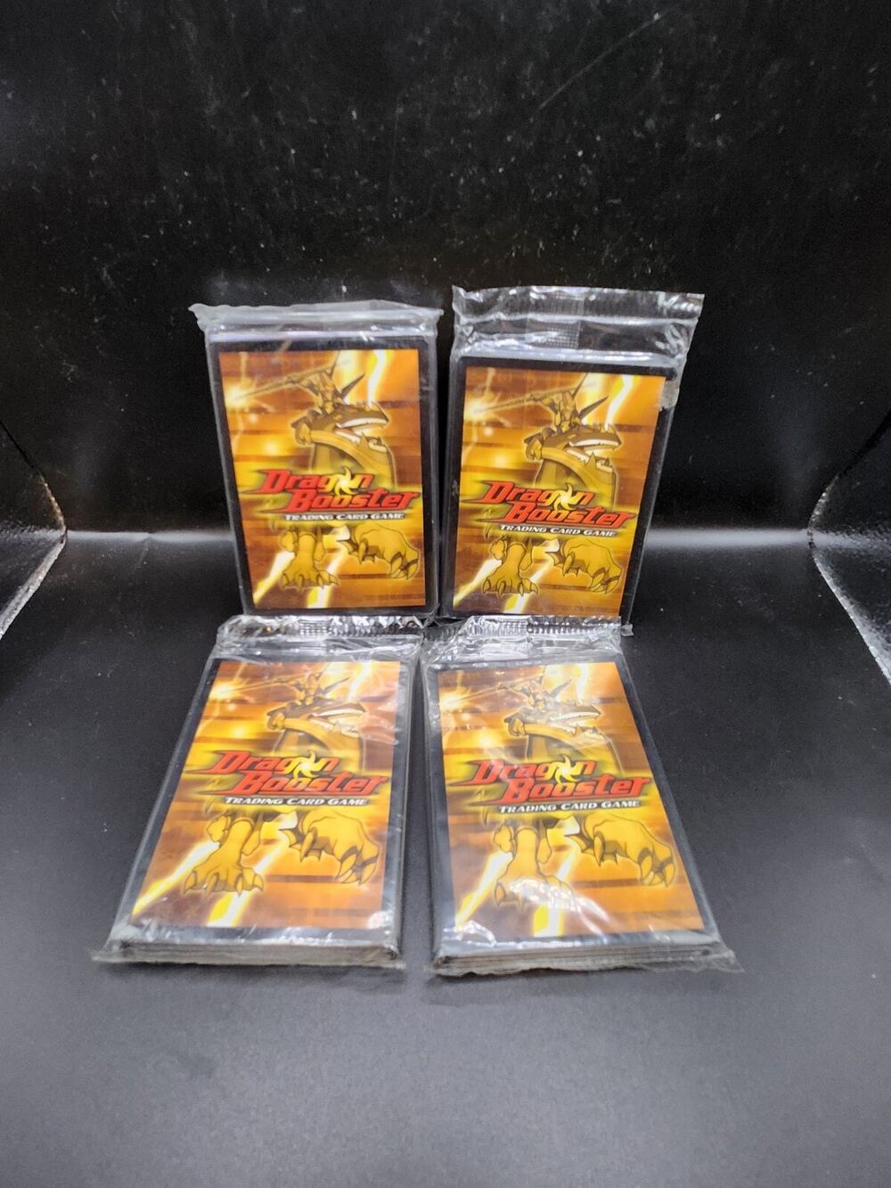 DRAGON BOOSTER TRADING CARD GAME DEMO GAME SEALED PACK NM CARDS. 4 Packs